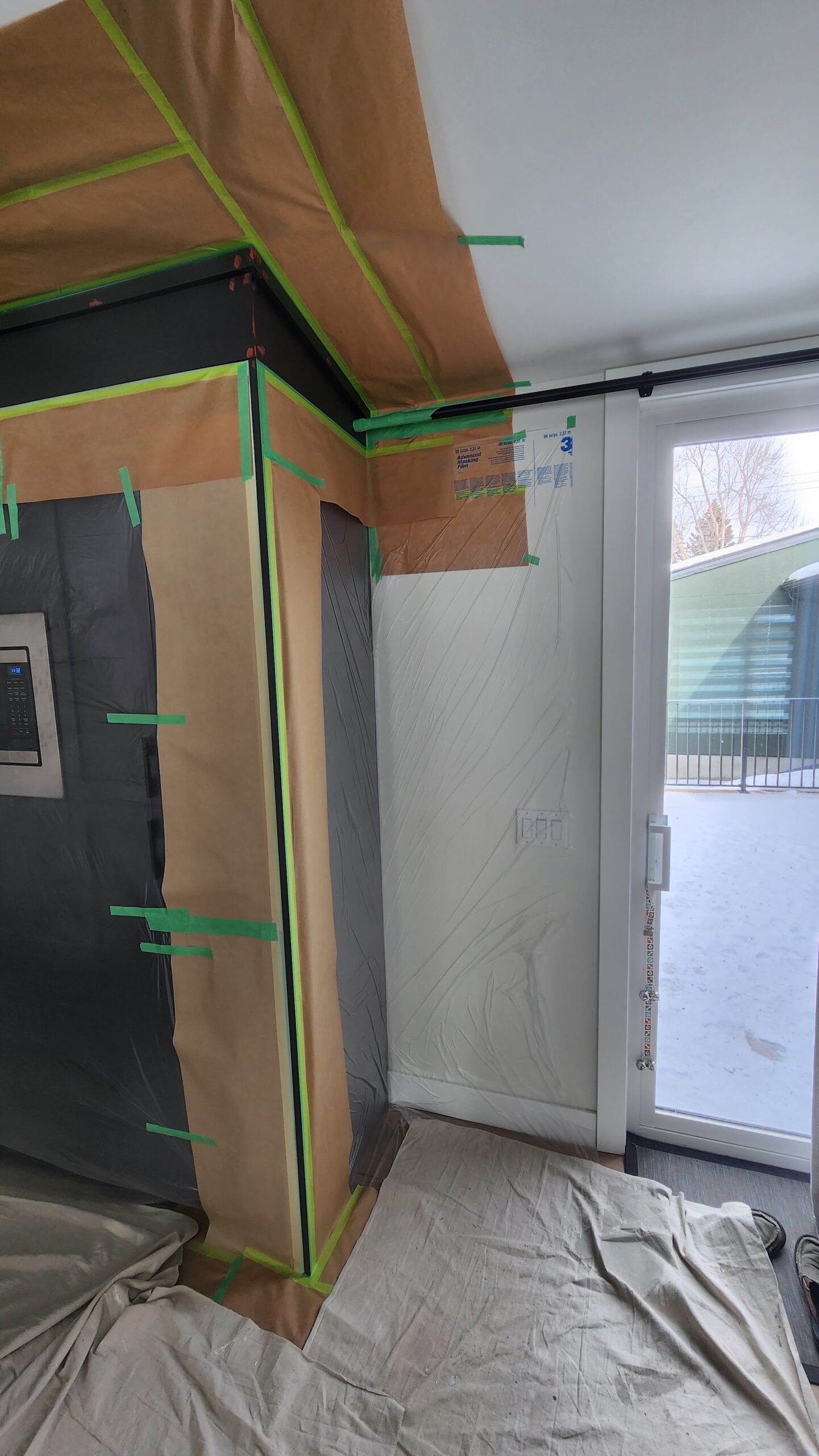 Door painting prep in a Calgary home