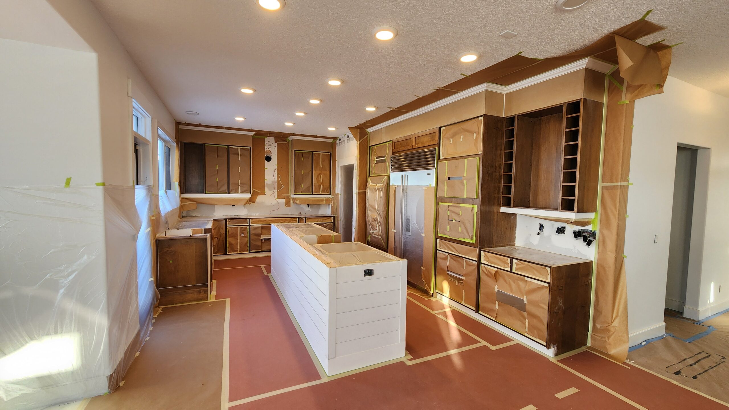 Open-concept kitchen repaint in progress